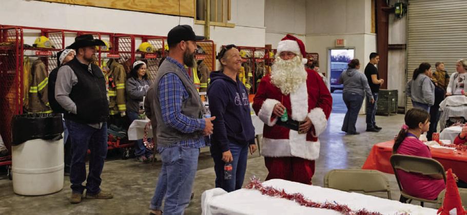The annual Lometa Hometown Christmas celebration was held in the Lometa Volunteer Fire Department fire station, and was attended by community members as well as special guests from the North Pole. ADAM BARRIOS | DISPATCH RECORD