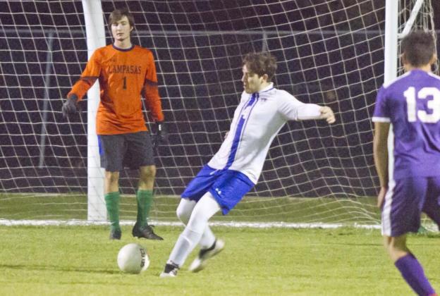 Nicholas Harron (4) clears the ball away from the Badger goal. Also pictured is goalkeeper Gavin Robinson, left. JEFF LOWE | DISPATCH RECORD