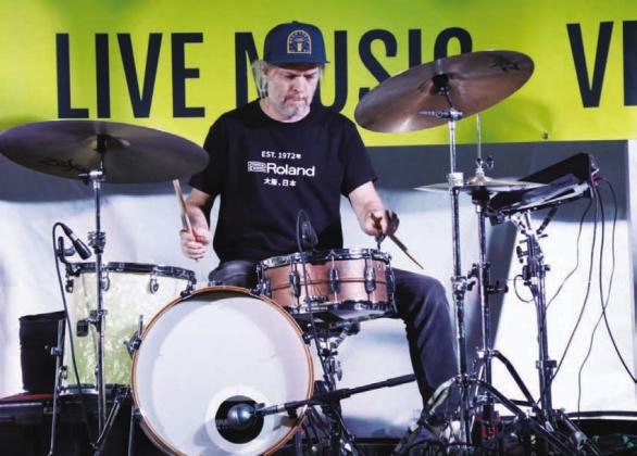 Drummer Cal Schneider gets into a groove at the Sun Festival on Sunday. The festival featured a number of notable performers including Ray Wylie Hubbard, Two Tons of Steel and local band, the Lampasas All Stars. CHERI JAY-WIENECKE | DISPATCH RECORD