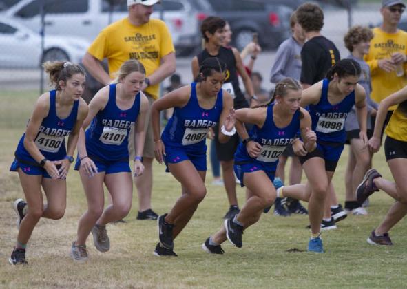 The Lady Badger cross country team takes off at the line during their home meet last Thursday at Lampasas High School. HUNTER KING | DISPATCH RECORD