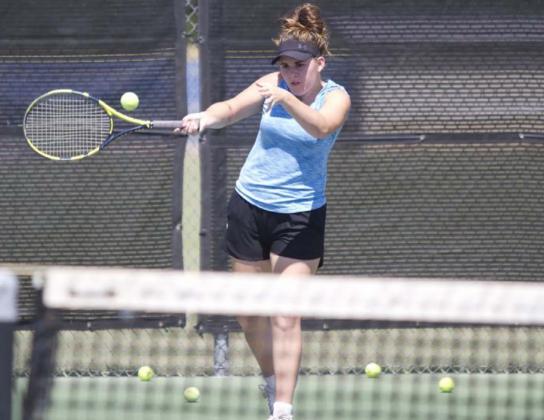 Kailr Clements hits a forehand shot during a tennis practice last week at Lampasas High School. HUNTER KING | DISPATCH RECORD