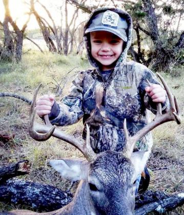 Young hunter shoots first buck
