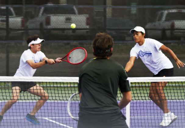 Sam Zmolik, left, and Mario Aguirre compete in the boys’ doubles district championship against Gatesville on Tuesday at Tarleton State University. JEFF LOWE | DISPATCH RECORD