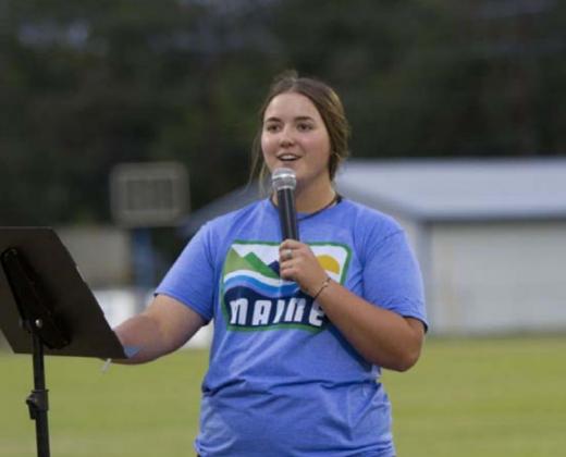 Saydie Smith speaks to the crowd at Fields of Faith. HUNTER KING | DISPATCH RECORD