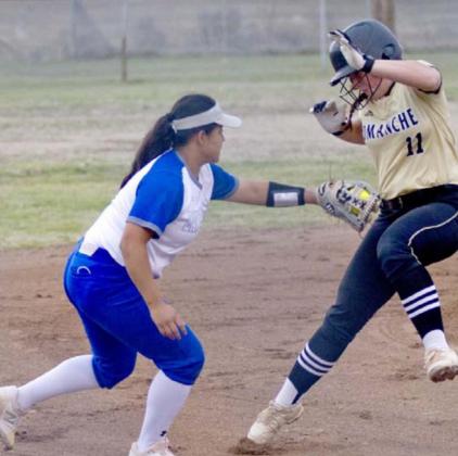 Mia Maldonado tags out a Comanche runner on the way to third base on Friday. JEFF LOWE | DISPATCH RECORD