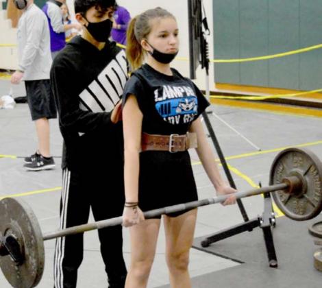 Lauren Hollace deadlifts at the regional meet in Dublin on Friday. JEFF LOWE | DISPATCH RECORD