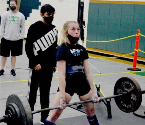 Alyssa Ayers deadlifts on her way to a regional record and fourth straight state meet qualification. JEFF LOWE | DISPATCH RECORD
