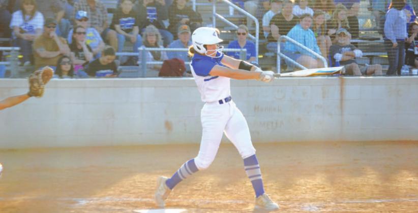 Hannah Perry follows through on a swing that sent the ball over the fence for her first home run of the game against Glen Rose last Friday. HUNTER KING | DISPATCH RECORD