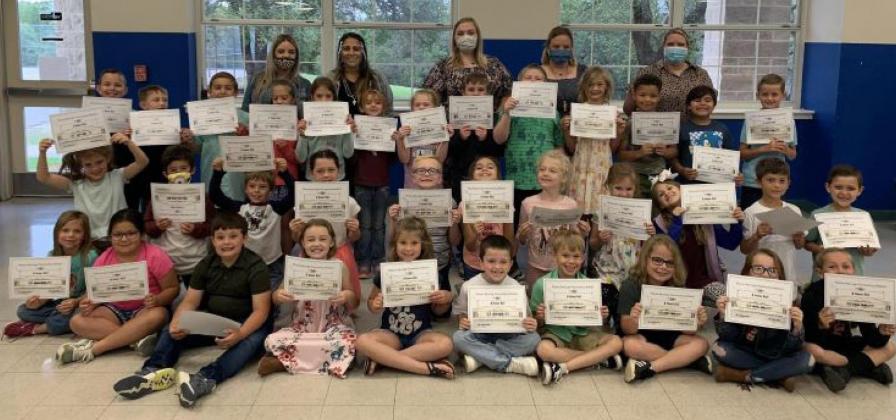 Hanna Springs Elementary School first-graders who kept an all-A average this year are shown with their teachers. COURTESY PHOTO