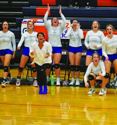 COURTESY PHOTO Head coach Christy Wiley and her team celebrate a big point.