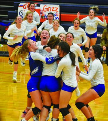 COURTESY PHOTO The Lady Badgers show their excitement after qualifying for the playoffs for the first time in 11 years.