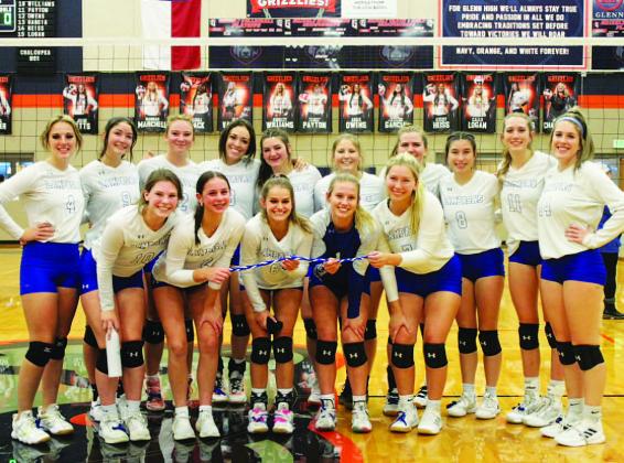 COURTESY PHOTO The volleyball team smiles after their play-in game win over Jarrell. They are headed to the playoffs.