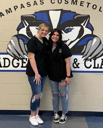 Megan Caddies, left, and Bella Guerra are now licensed cosmetologists after passing their state exams. COURTESY PHOTO