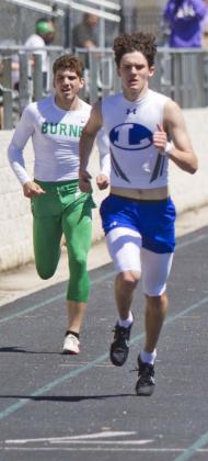 Cody Hinson beats a Burnet runner in the 400-meter dash for a silver medal on Thursday. Lampasas is scheduled to compete in the district meet in Brownwood March 31-April 1. JEFF LOWE | DISPATCH RECORD