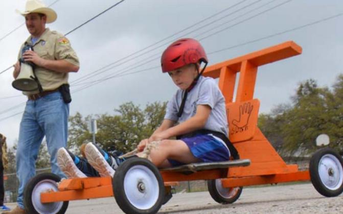 Seven-year-old Philip Ischy of Lampasas Pack 100 competes in his first Downhill Derby Race. MONIQUE BRAND | DISPATCH RECORD