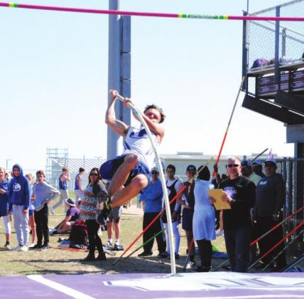 Wilson Hammond pulls himself up during pole vault at the Thrall track meet last Thursday. Hammond finished third overall. HUNTER KING | DISPATCH RECORD