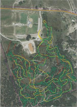 COURTESY PHOTO | CITY OF LAMPASAS City of Lampasas planning documents show two possible orientations for bike trails in the 580 Sports Park. The first trail option is marked by yellow and the second by green. Red trails indicate possible layout for the disc golf course.