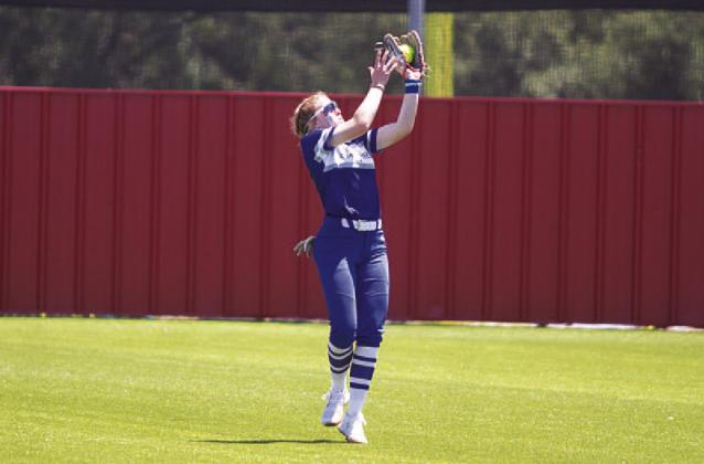Aspen Wheeler drifts out to shallow center field to catch a pop fly. HUNTER KING | DISPATCH RECORD