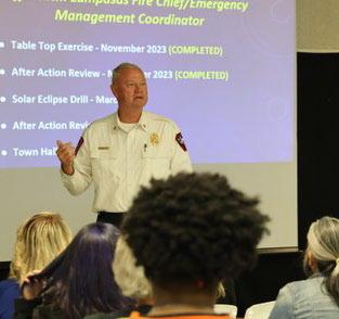 JOYCESARAH MCCABE | DISPATCH RECORD Lampasas Fire Chief Jeff Smith, who also serves as the city’s emergency coordinator, makes a presentation at a December town hall to update citizens about preparations for the total solar eclipse in April that is expected to bring thousands of travelers to town to view the event.