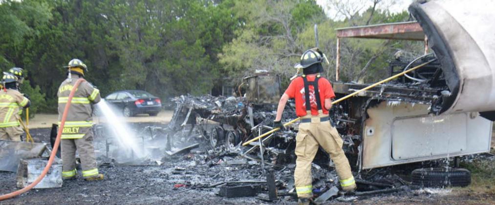 Members of the Kempner Volunteer Fire Department cleared out a camper that was engulfed in flames for close to 30 minutes Tuesday afternoon. No injuries were reported. MONIQUE BRAND | DISPATCH RECORD