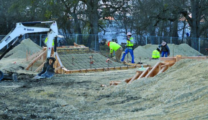 The Lampasas Skate Park is taking literal shape this week as crews from SPA Skate Parks shave the final elevation and set concrete forms. ERICK MITCHELL | DISPATCH RECORD