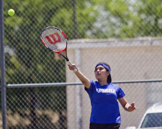 Mia Bazaldua, pictured above, and Tyler Wells won consolation finals in seventh-grade doubles at the LMS tennis tournament on Saturday. JEFF LOWE | DISPATCH RECORD
