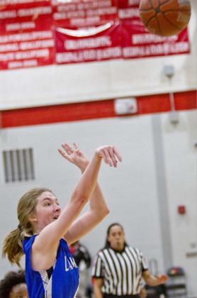 Taylor Allen shoots a three-pointer in a recent game. JEFF LOWE | DISPATCH RECORD