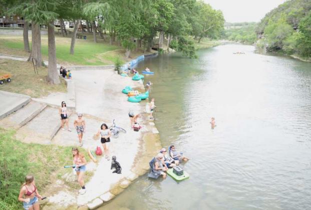 Families enjoy a float down the Guadalupe River on a hot summer day. Tubing, swimming and kayaking are all outdoor activities that families can enjoy together and require a little bit of exercise. |ALEXANDRIA RANDOLPH | DISPATCH RECORD
