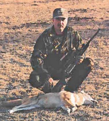 Harold Harton’s son, Hal Harton, is shown with a coyote that wasn’t able to elude the experienced hunter. HAROLD HARTON | COURTESY PHOTO