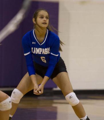 Kayli Syx prepares to complete a pass during a previous match against Florence. The Lady Badgers are set to play the Jarrell Cougars on Tuesday. HUNTER KING | DISPATCH RECORD
