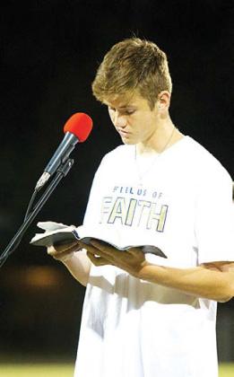 hunter king | Ldispatch record Lampasas High School senior Keaton Black reads a passage from the Bible before introducing his father, Kyle Black, to speak.