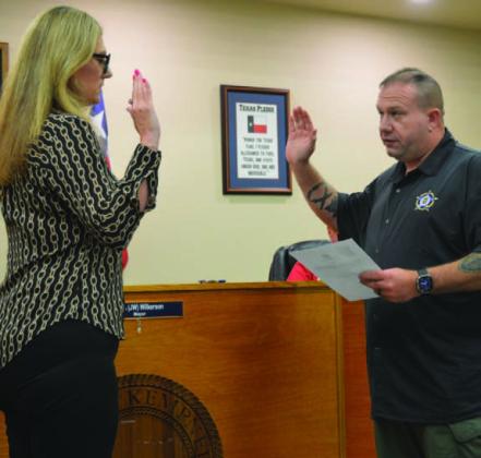 ERICK MITCHELL | DISPATCH RECORD At right, Kempner Mayor John Wilkerson administers the oath of office for new Court Clerk/Assistant City Secretary Rebecca Ramos. Kempner City Council members discussed staffing changes during Tuesday’s budget workshop.
