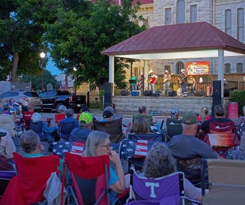 Adam Barrios | dispatch record The Lucas Brothers Band graced the Courtyard Square bandstand on Friday night to a full audience.
