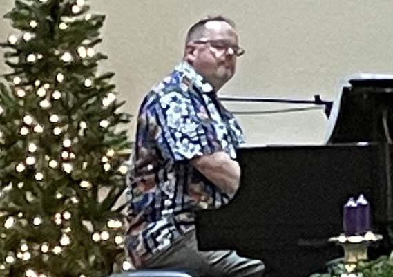 Music teacher and composer Neill Herndon offered a concert for the DRT chapter after its Christmas dinner last week. courtesy photo