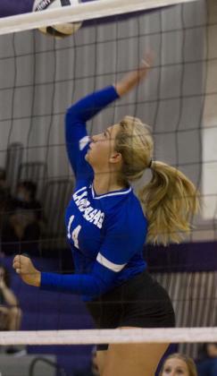 Madison Roedler goes up for a spike during the Lady Badgers’ match against Florence. HUNTER KING | DISPATCH RECORD