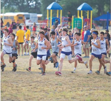 The Lampasas boys’ cross country team takes of from the start line at the Badger home meet on Thursday. HUNTER KING | DISPATCH RECORD