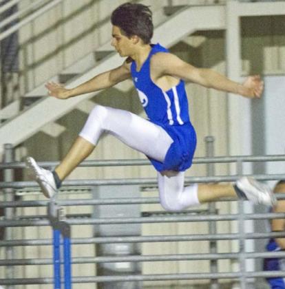 Asa White placed second in the 300-meter hurdles and won the Badger JV’s only gold medal in pole vault in the March 11 meet. JEFF LOWE | DISPATCH RECORD
