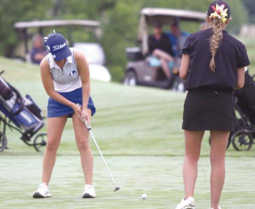 Kenlee Turner hits a par putt early in her second round at the state tournament in Kingsland. HUNTER KING | DISPATCH RECORD