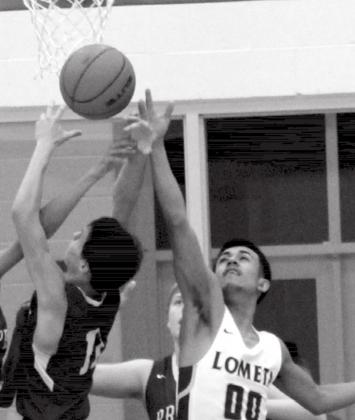 Senior guard Enrique Caso, right, shown in a previous game, led the Hornet offense on Tuesday. FILE PHOTO