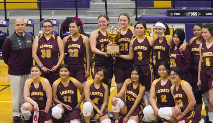 The Lometa Lady Hornets celebrate a bi-district championship victory over Gustine in Early on Saturday. JEFF LOWE | DISPATCH RECORD
