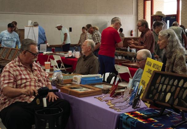FILE PHOTO Vendors often take time to visit with attendees at Vision Lampasas’ Indian Artifact &amp; Mineral and Gem Show. This year’s event is set for Sept. 12 from 9 a.m. to 3 p.m. in the old middle school cafeteria.