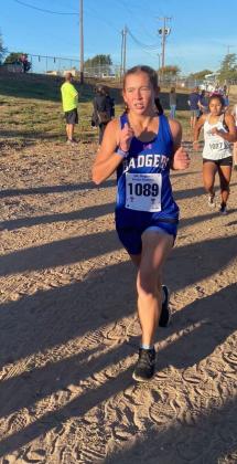 Abby Valdez runs down the trail during the regional meet in Lubbock on Monday. COURTESY PHOTO
