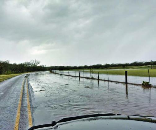 Water covers the FM 1478 roadway on Nov. 11 after a severe thunderstorm dropped 2.62 inches of rain across Lampasas, and hail pummeled cars, homes and businesses across town. Wind gusts of up to 50 mph also were reported by the National Weather Service. COURTESY PHOTO