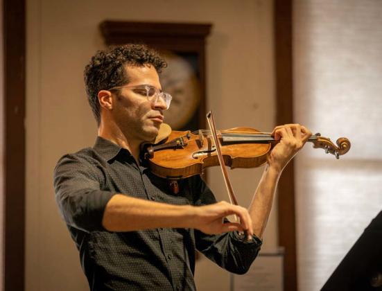 Violinist Patrice Calixte, member of the Artistan String Quartet, will perform during the Lampasas County Chamber Music Festival on June 1-4. He is pictured here at a previous performance at the Lampasas County Courthouse. courtesy photo | kairo media