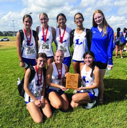 COURTESY PHOTO Lampasas’ girls’ cross country team finished in first place at the Bronco Invitational, hosted by Lake Belton. Hadlee McCorkle earned a first-place finish individually.
