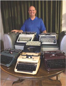 Rick Willis now has a collection of 35 typewriters, the oldest of which was made in 1919. He is pictured here with some of his favorite models. COURTESY PHOTO