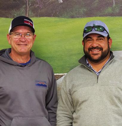 HUNTER KING | DISPATCH RECORD Van Berry, left, poses with new golf course manager Kris Morin as he takes over the position.