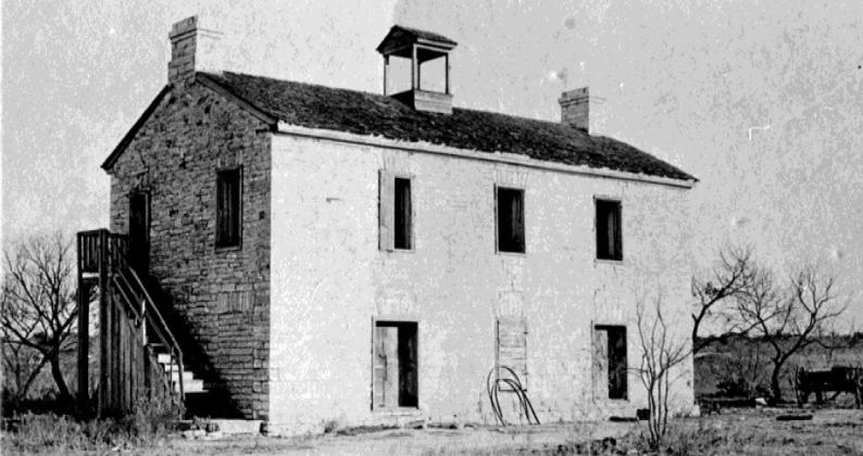The college building was a two-story limestone structure that stood southeast of the public square, near Sulphur Creek. COURTESY PHOTO