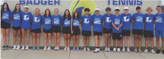 KENNETH PEISER | COURTESY PHOTO The tennis team poses for a photo before heading to Stephenville for their match.