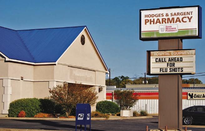 Hodges & Sargent Pharmacy will soon expand into the building next door, the former location of Bancorp South. HUNTER KING | DISPATCH RECORD